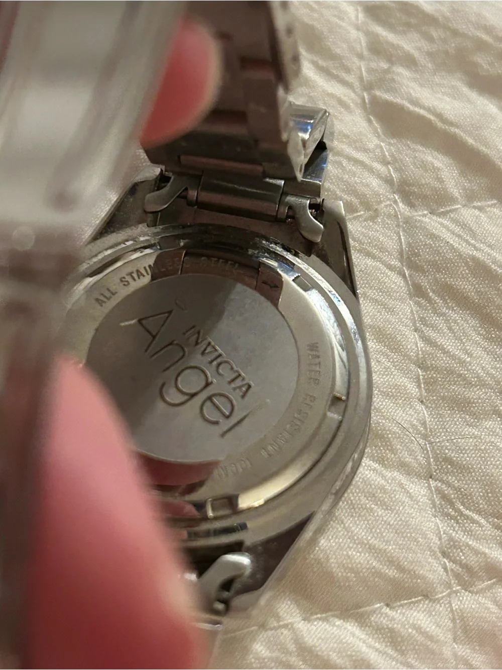 Invicta Silver Watch with Blue Accents and Crystal Bezel